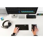 Teclado inalámbrico multidispositivo tecnología dual negro vista frontal en uso